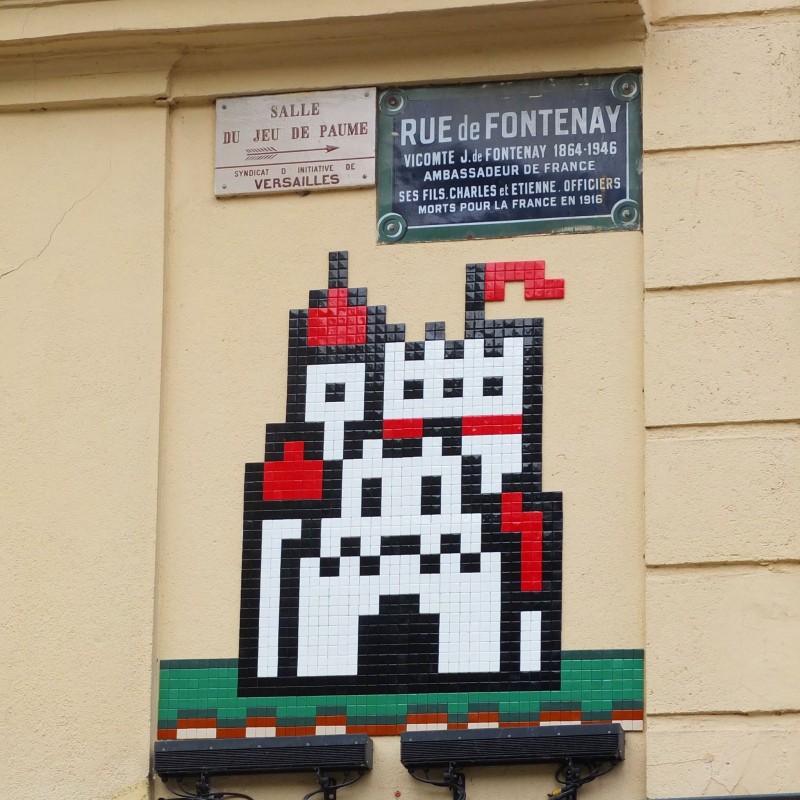 Street art invader shaped castle